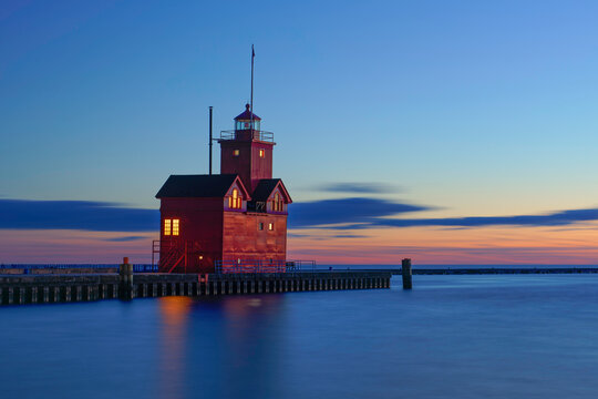 Holland Michigan Lighthouse on Lake Michigan in the Evening with the Sunset