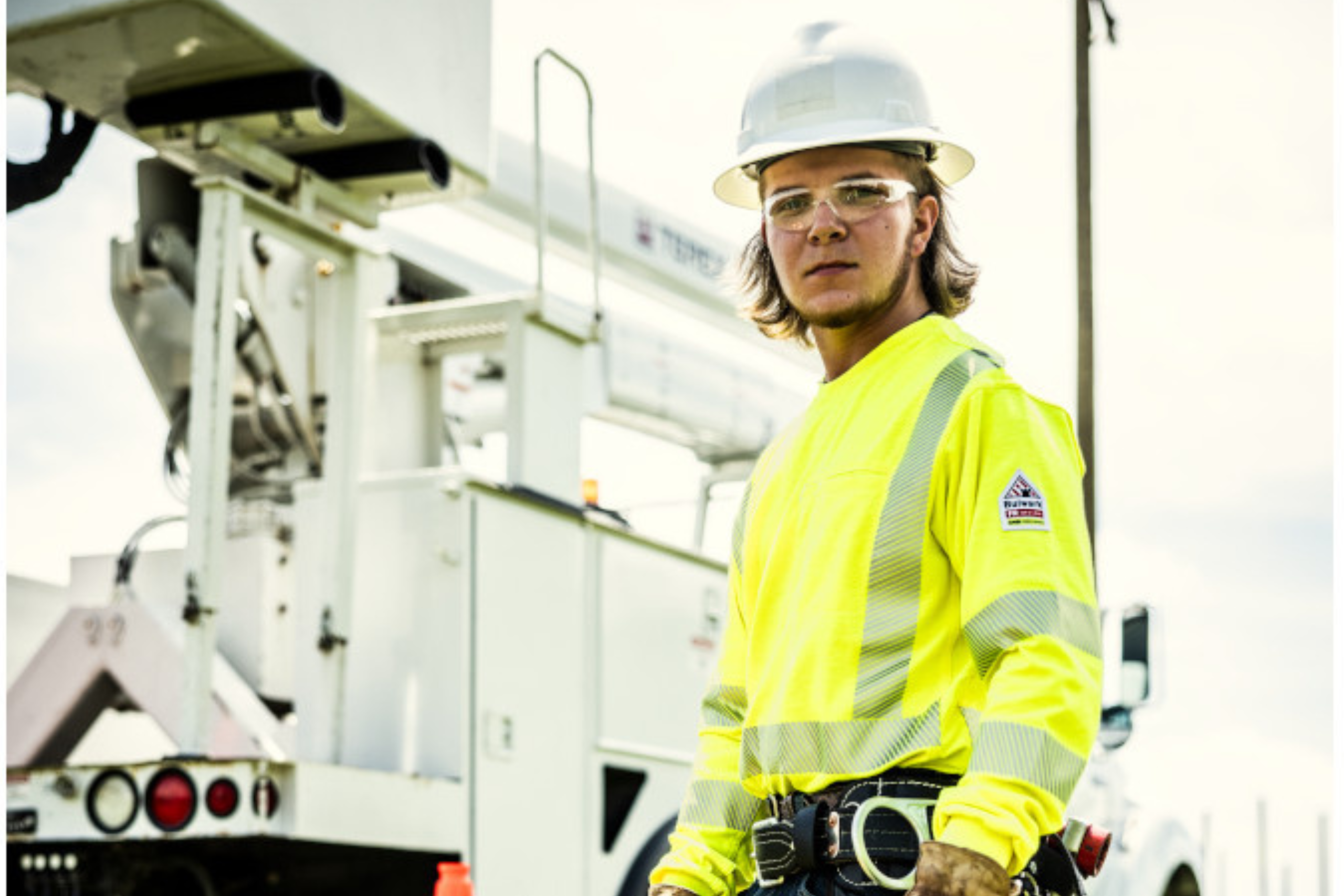 live electrical - worker by truck